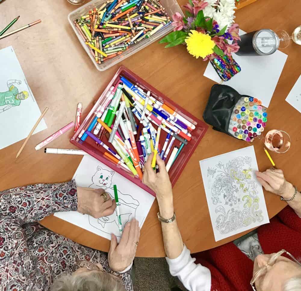 Shot from above of senior ladies coloring in Green Bay, Wisconson.