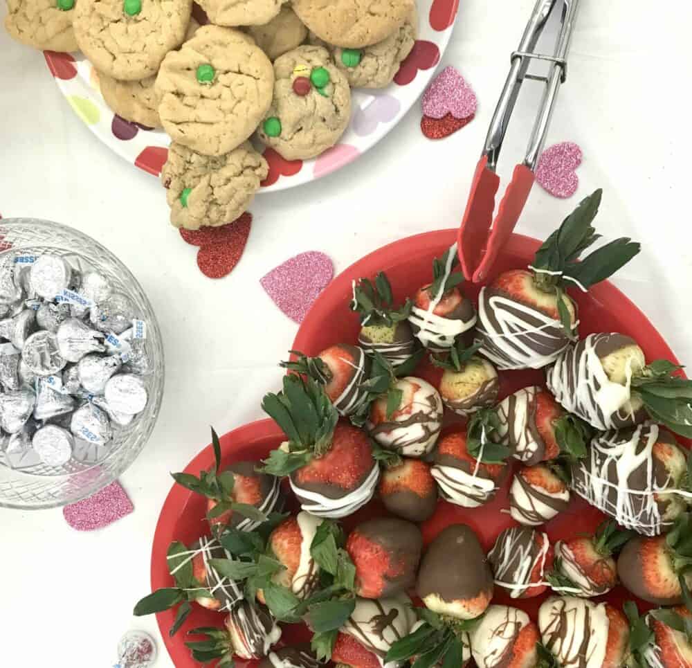 Valentine's Day food including M&M cookies, chocolate kisses and chocolate covered strawberries at senior living facility in Green Bay, Wisconsin.