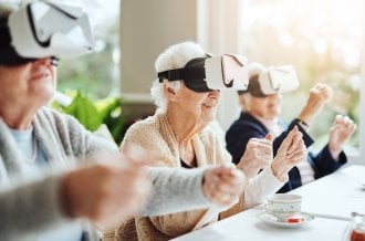 Group of seniors learn how to interact with virtual reality