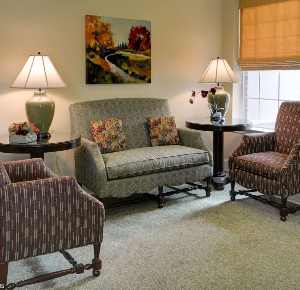 Cozy seating area with couches at senior living community in Plano, Texas.