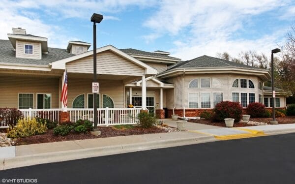 Front entrance with sitting area to senior living community in Lincoln, Nebraska.