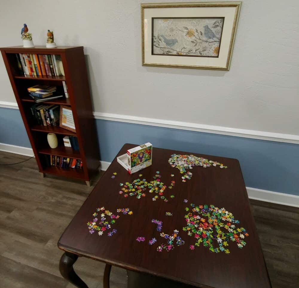 Puzzle area in the activity center at a senior living facility in Conroe, Texas.