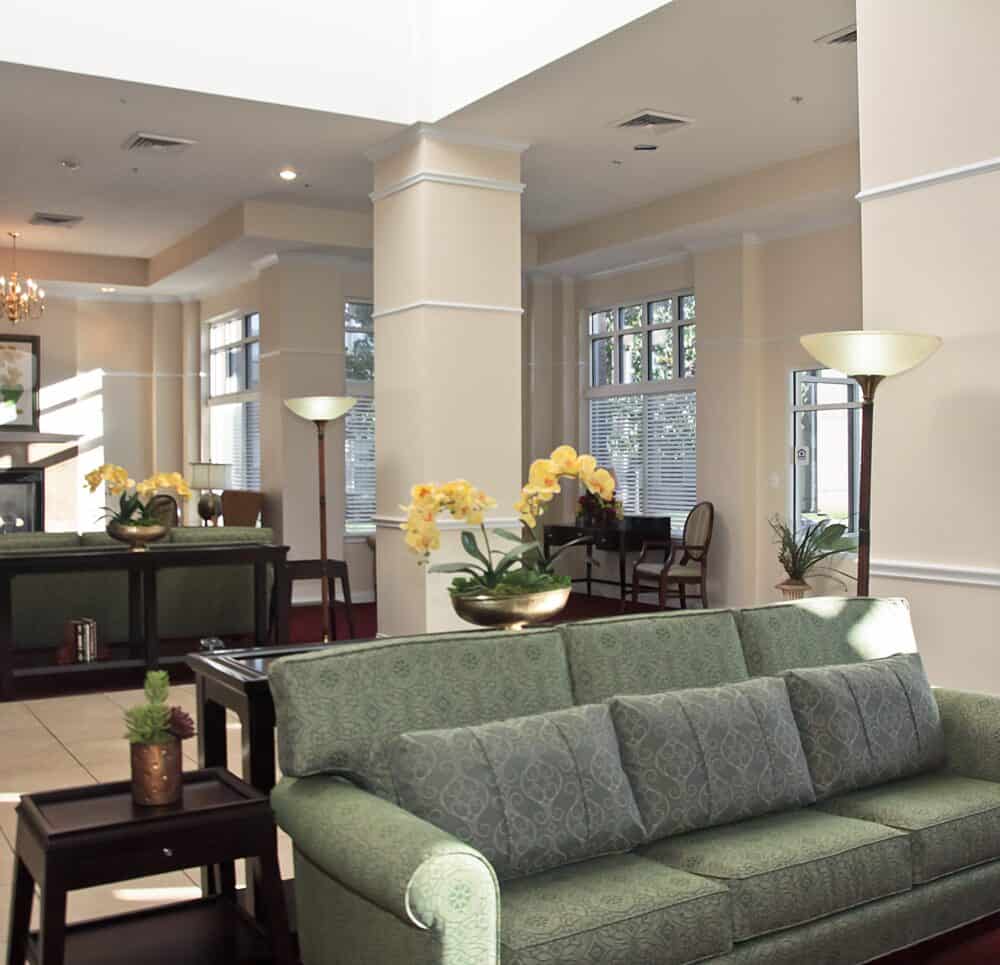 Lobby entrance with seating area at a senior living community located in Springfield, Missouri.