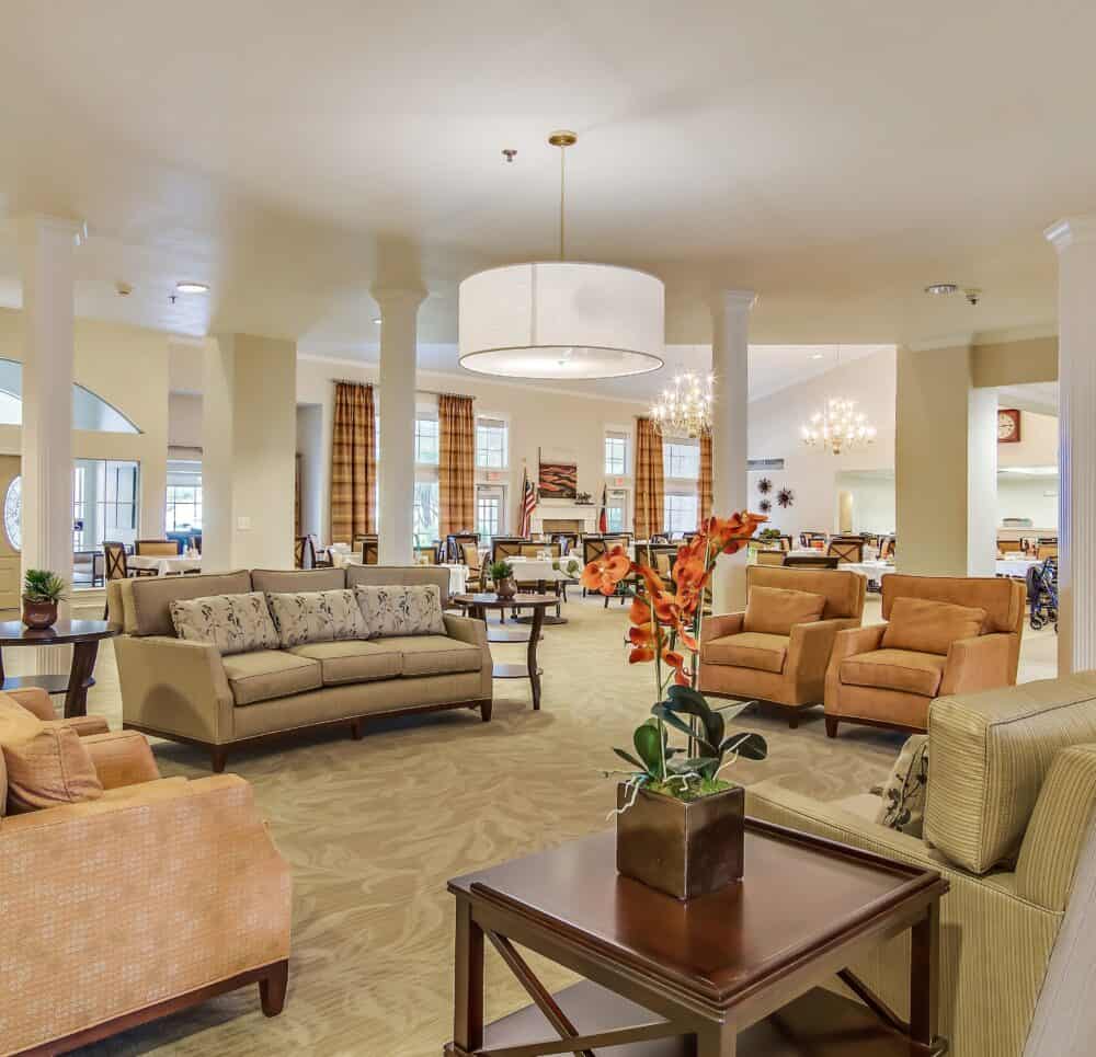 Lobby with plenty of seating at a senior living community in San Antonio, Texas.