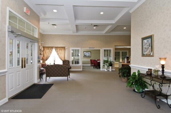 Lobby area entrance with seating at a senior living community in Columbiana, Indiana.