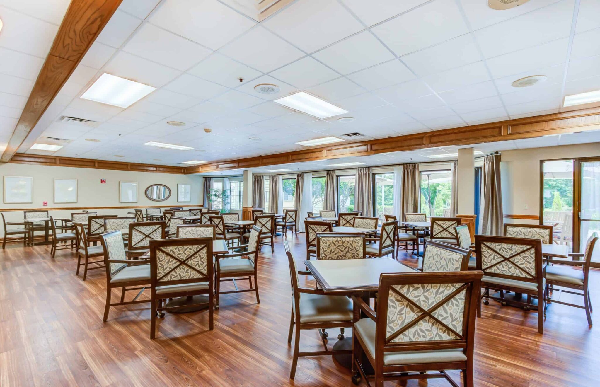 Senior living dining room with comfortable seating and natural light in Hot Springs, Arkansas