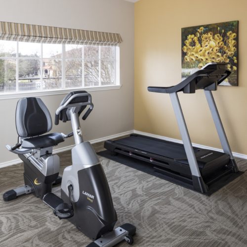 On-site gym includes a treadmill and stationary bike