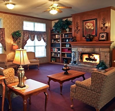 A cozy fireplace with comfortable lounge seating in Jeffersonville, Indiana.