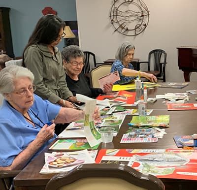 Residents enjoying a craft activity in Humble, Texas.