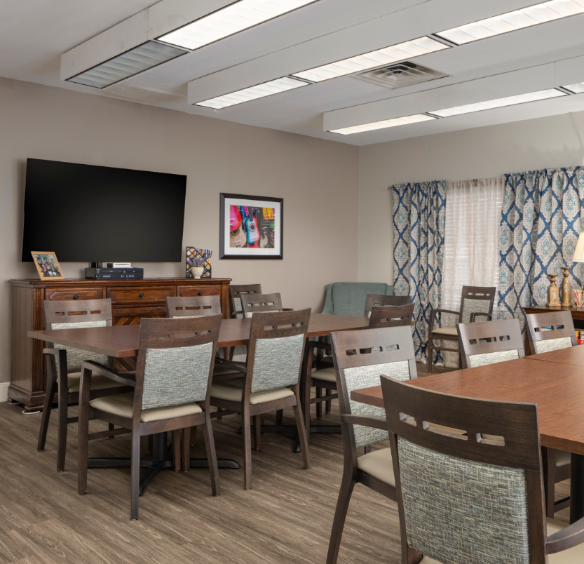 Cozy sitting area with a television at a senior living community in San Antonio, Texas