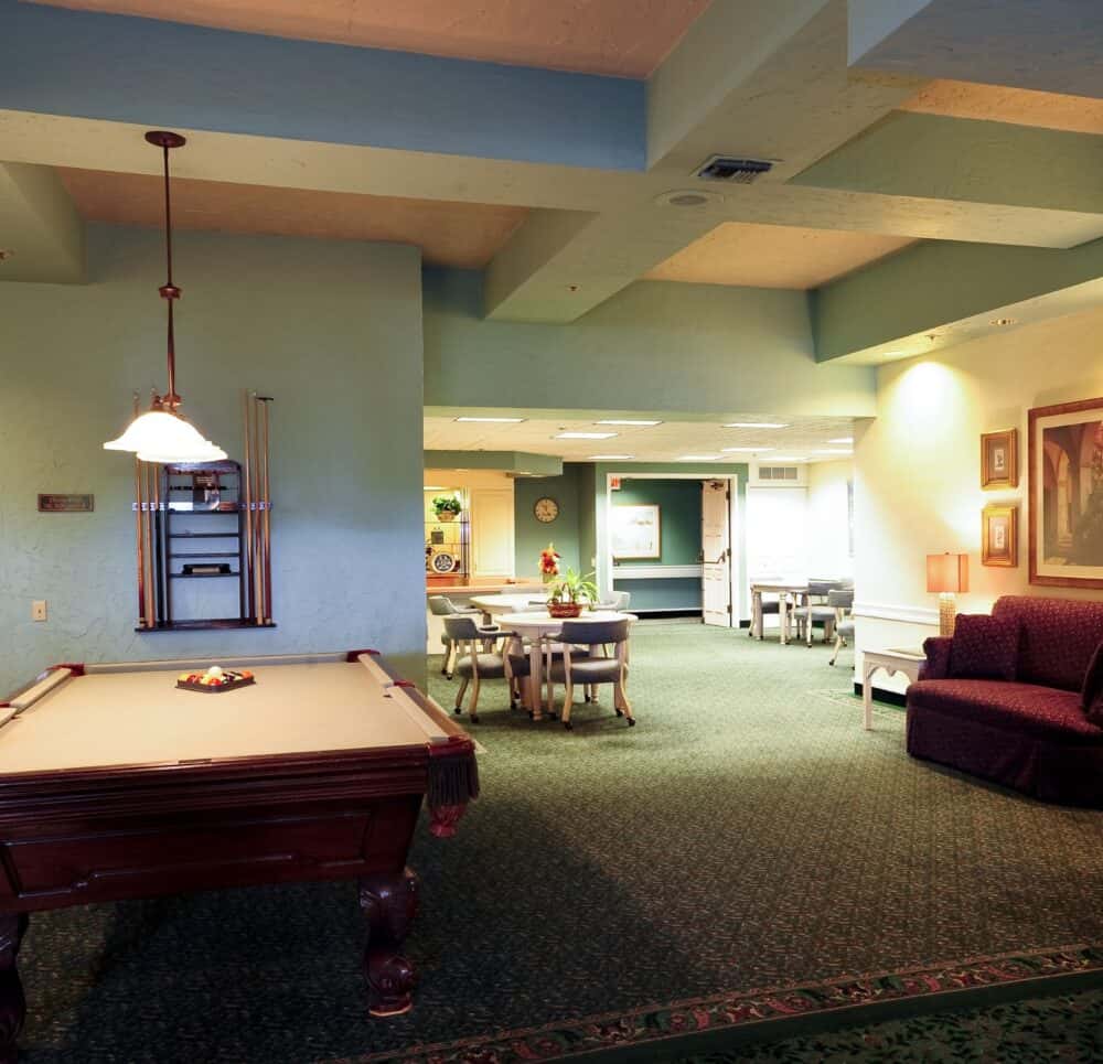 Billiards table and lounge space at the Villa Santa Barbara, a senior living community in Santa Barbara, California