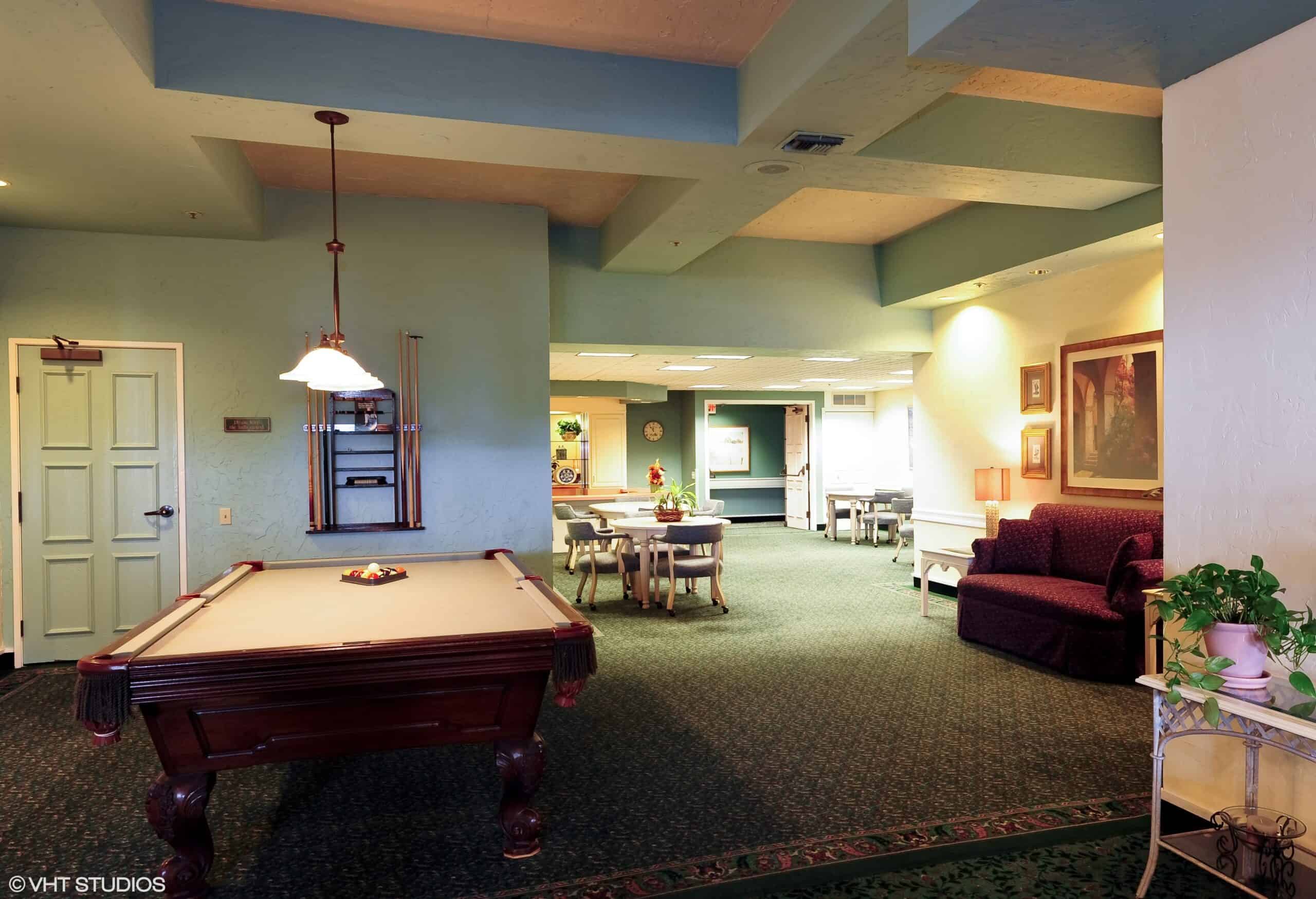 Billiards table and lounge space at the Villa Santa Barbara, a senior living community in Santa Barbara, California