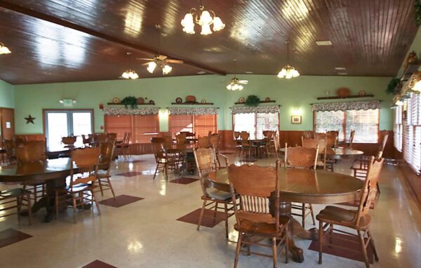 Large dining room with many chairs and tables at a senior living community in Greenwood, Indiana.