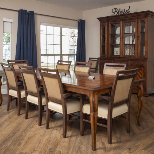 Private dining room with a large table that can accommodate eight people