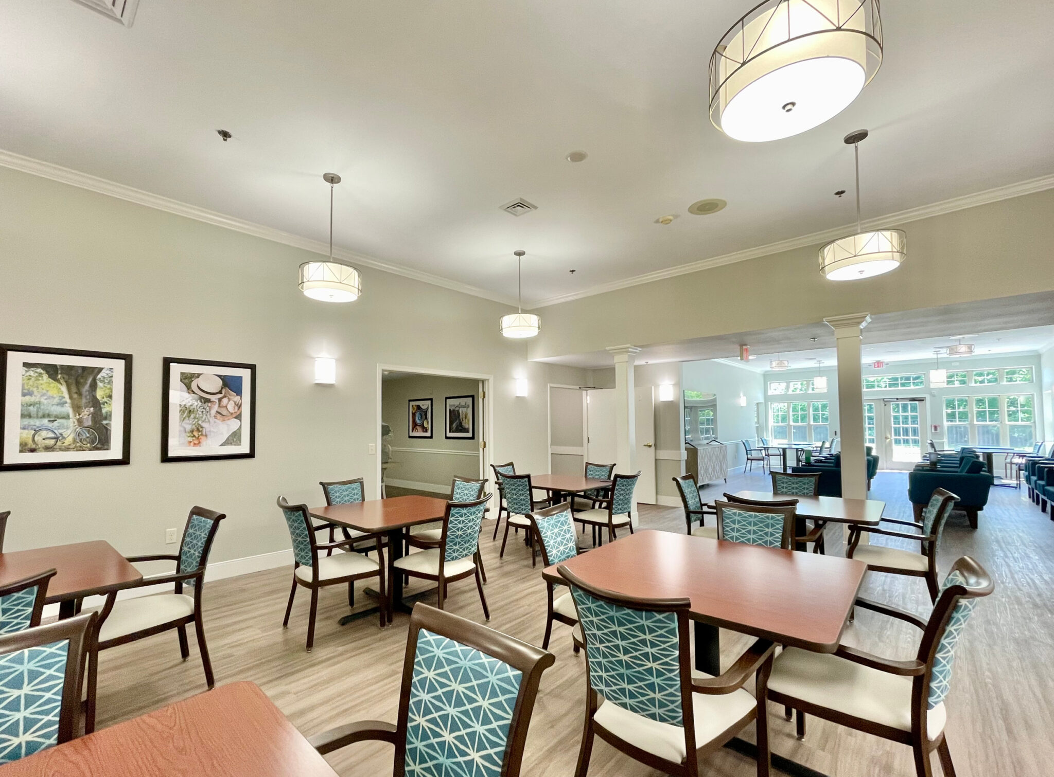 Rose Arbor dining area includes many tables and chairs for seniors to enjoy meals together