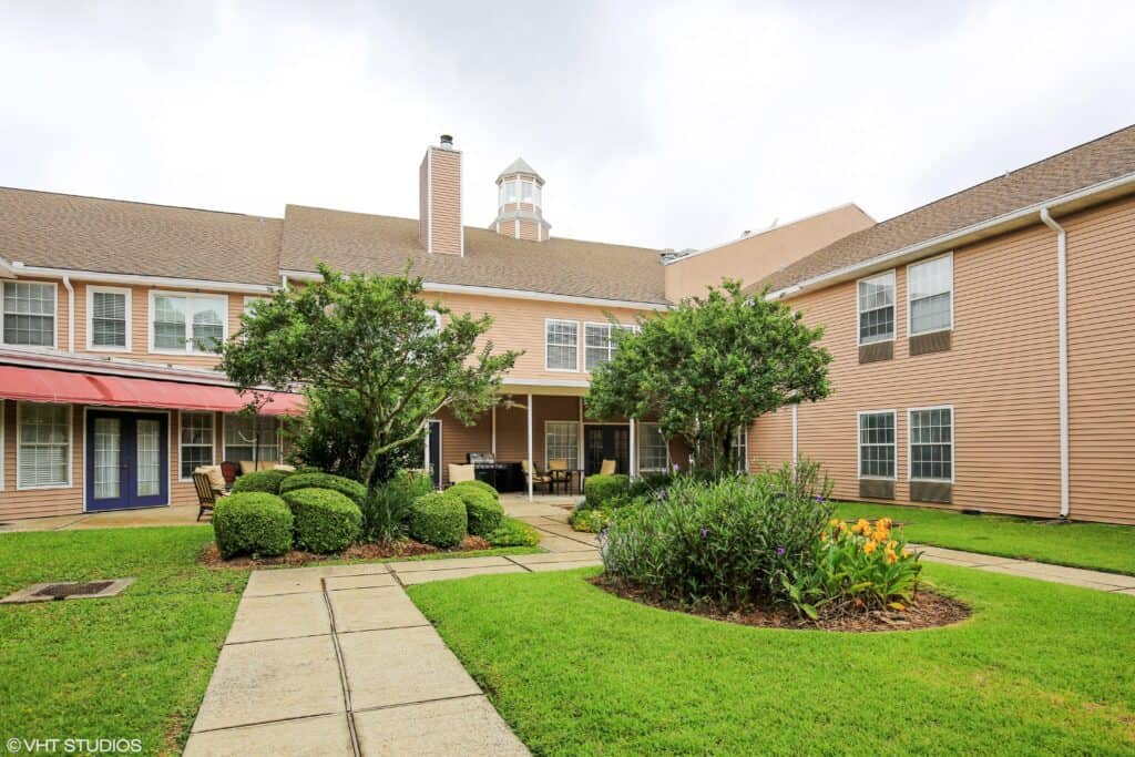 outdoor patio at the waterford at carpenter\'s creek senior living community in pensacola, florida