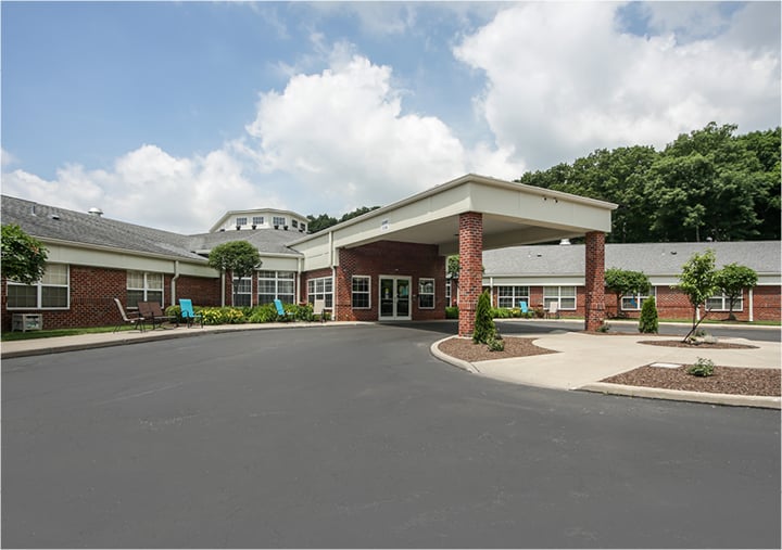 Front entrance of Aspen Grove senior living facility in Lambertville, Michigan.