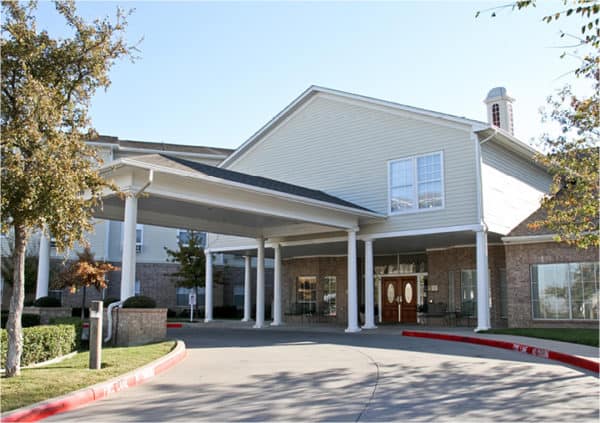 Front entrance of a senior living facility in Fort Worth, Texas.