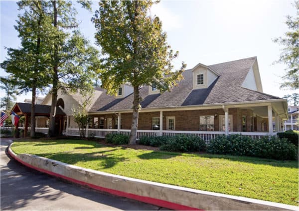 Front entrance of a senior living facility in Conroe, Texas.