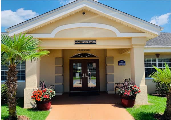 Front entrance of a senior living facility in Pensacola, Florida.