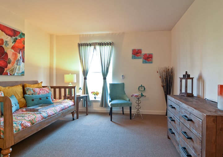 A model apartment featuring a spacious living/sleeping area.