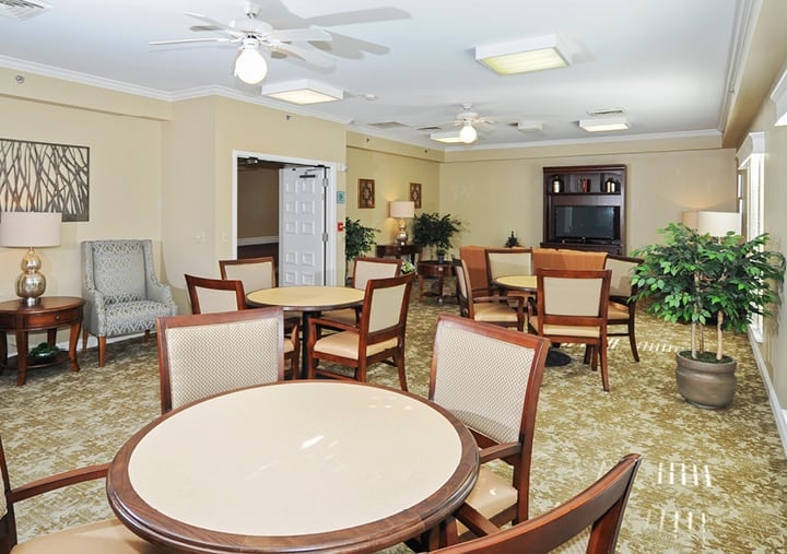 Lounge area with couches and a TV at the Wellington at Southport in Indianapolis, Indiana.