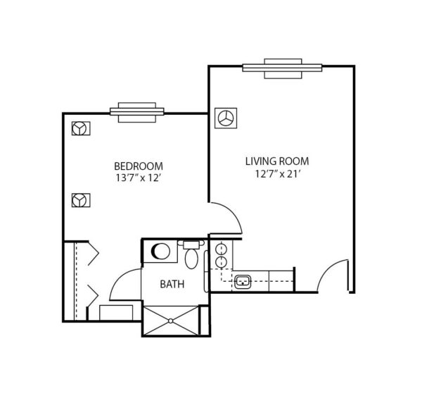 One-bedroom apartment floorplan with living room, bathroom and kitchen at a senior living facility in Greencastle, Indiana.