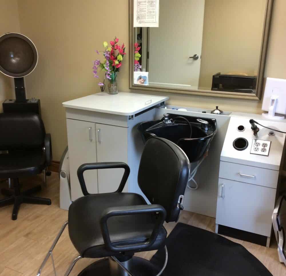 On-site salon with chair, sink and hair dryer at the Keystone Woods in Anderson, Indiana.