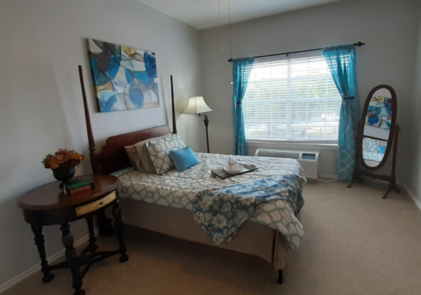 Model bedroom in a senior apartment at a senior living community in San Antonio, Texas.