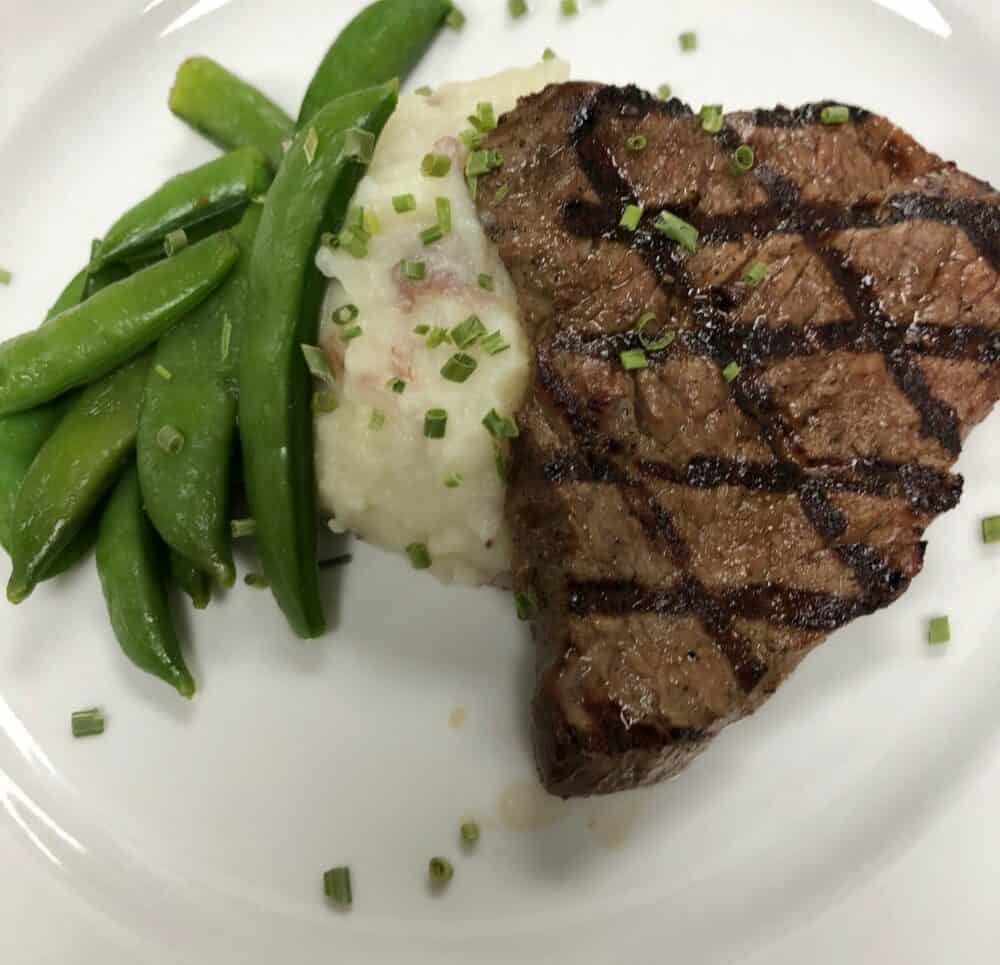 Closeup of steak, veggies and potatoes at a senior living community located in Ridgeland, Mississippi.