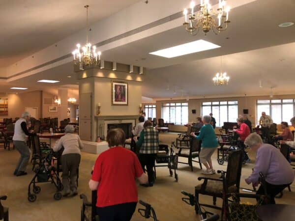 Group of seniors exercising at the Independence Village of East Lansing, a senior living community in East Lansing, Michigan.