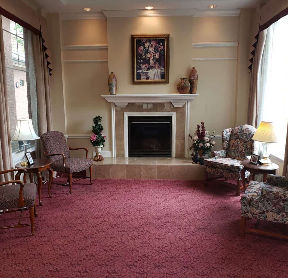 Fireplace seating area at a senior living community located in Fairfield, Ohio.