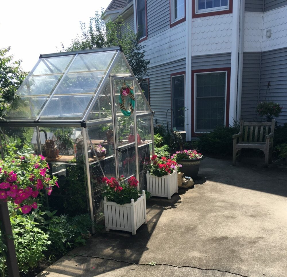 Gardens and greenhouse at a senior living community in Rochester, Indiana.