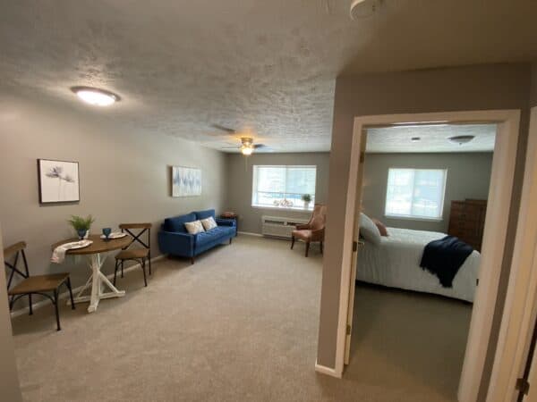 Bedroom and living area at a senior living community in Omaha, Nebraska.