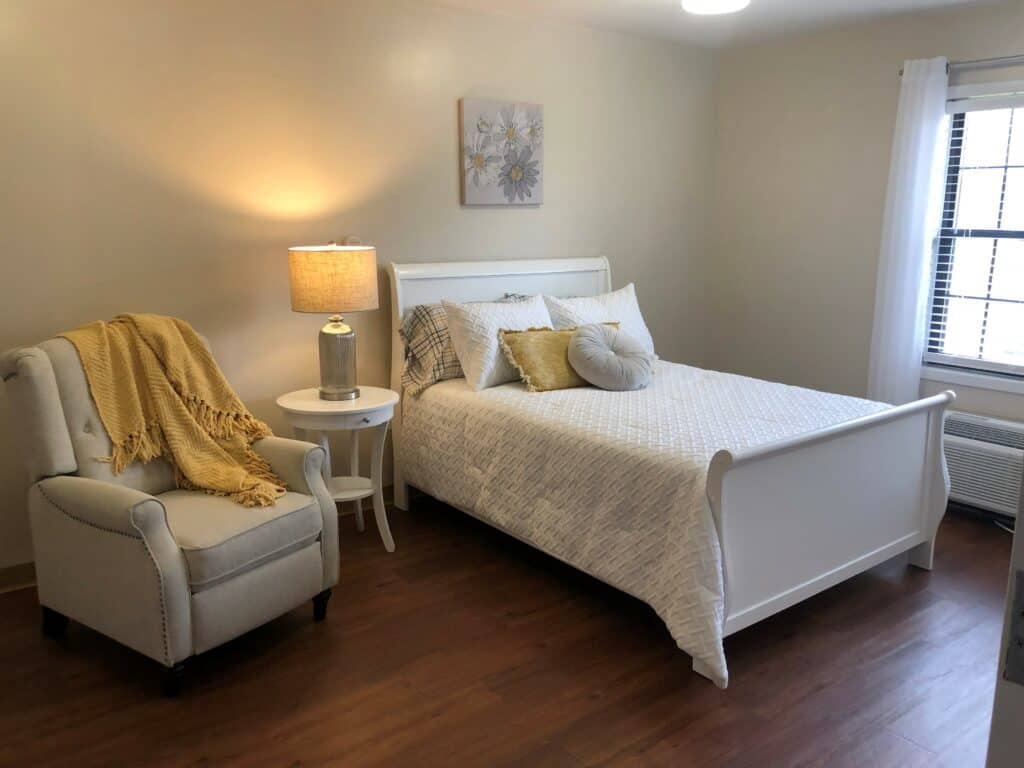 Senior apartment bedroom at senior living community in Anderson, South Carolina.