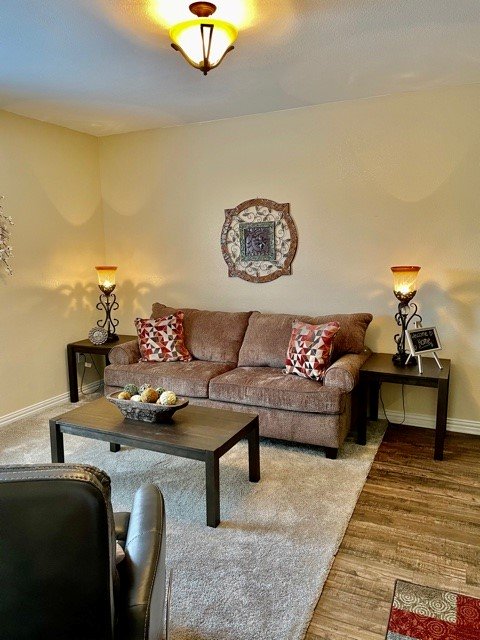 Senior apartment living room with couch and lamps at a senior living facility in Fort Worth, Texas.