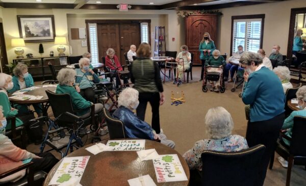Group of seniors playing a game at the Vintage Gardens, a senior living community in St. Joseph, Missouri.