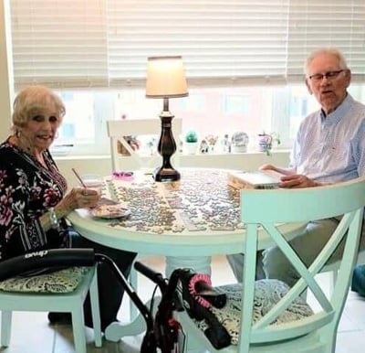 Senior man and woman solving a puzzle together in senior living community in Cincinnati, Ohio.