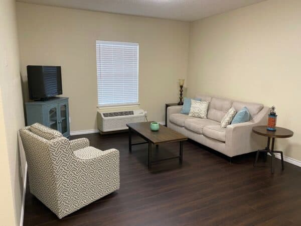 Living room in a senior apartment at The Waterford at Ironbridge, a senior living community located in Springfield, Missouri.