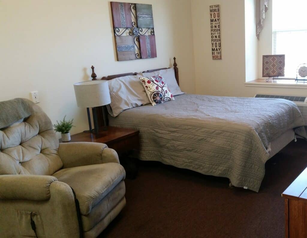 Senior apartment bedroom at Vintage Gardens, a senior living community in St. Joseph, Missouri.