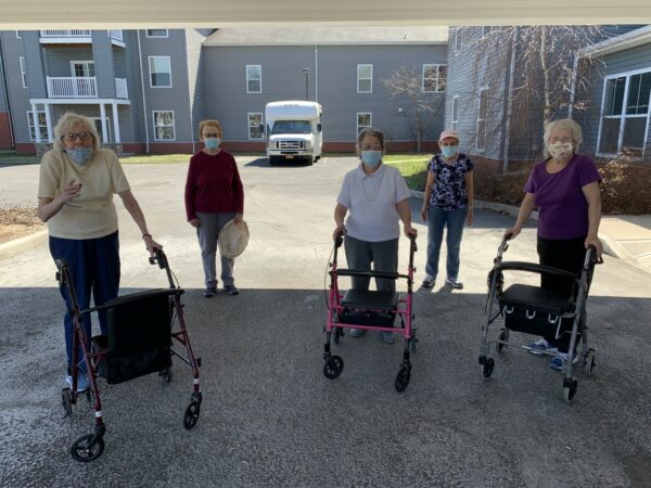 Group of senior women walk together outside at a senior living community in Oneonta, New York.
