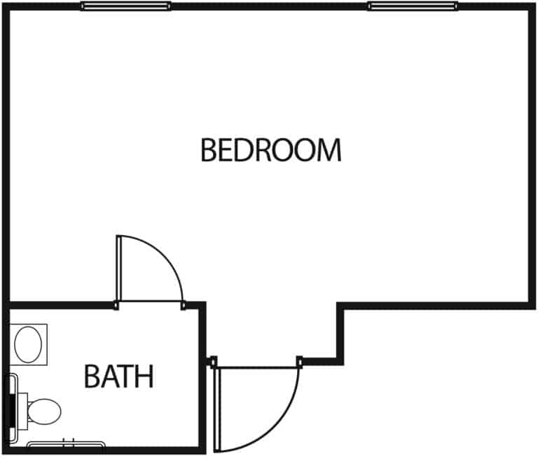 Studio apartment with a bathroom at a senior living facility in Baytown, Texas.