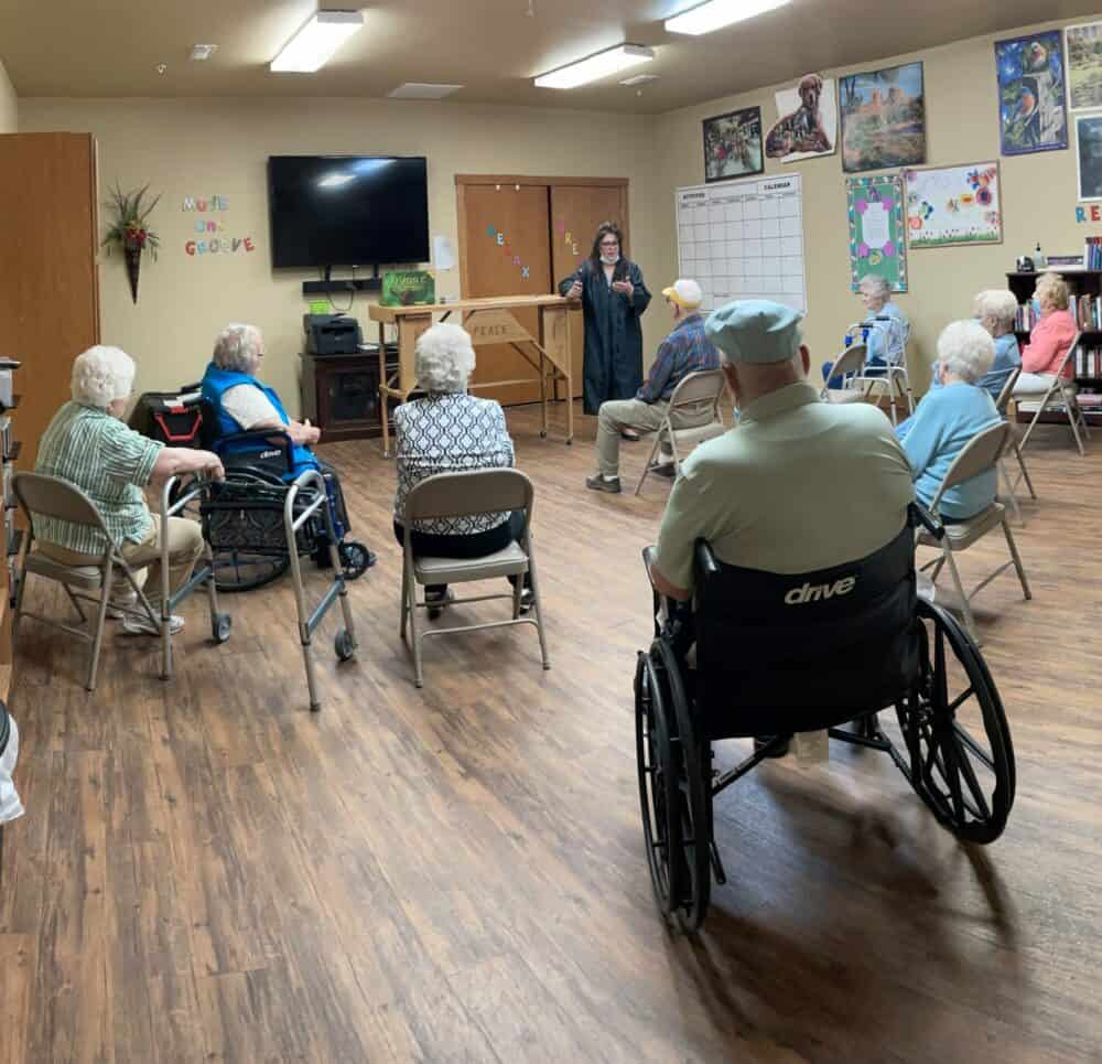 Activity room filled with a group of seniors at a senior living community, located in Park Falls, Wisconsin.