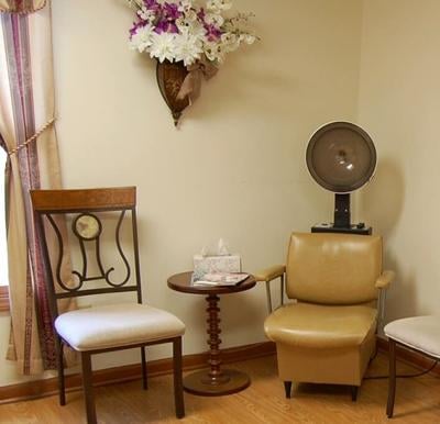 On-site beauty salon with two chairs inside Country Charm assisted living