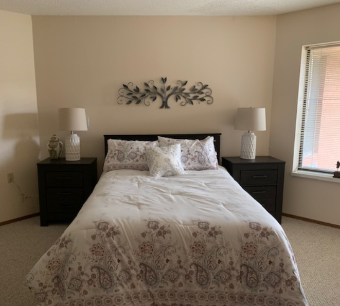 Senior apartment bedroom at a senior community in East Lansing, Michigan.