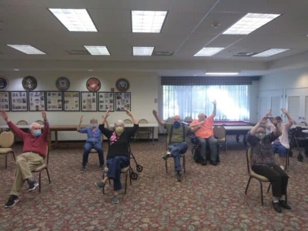 Group of seniors participating in an exercise class at senior living facility in Fairfield, Ohio.