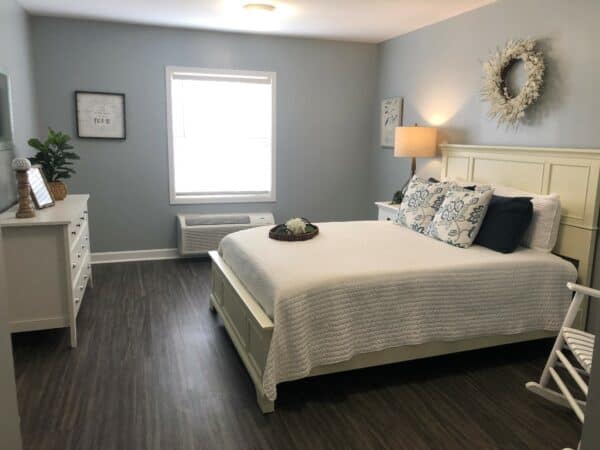 Senior apartment bedroom at North Pointe, a senior living community in Anderson, South Carolina.