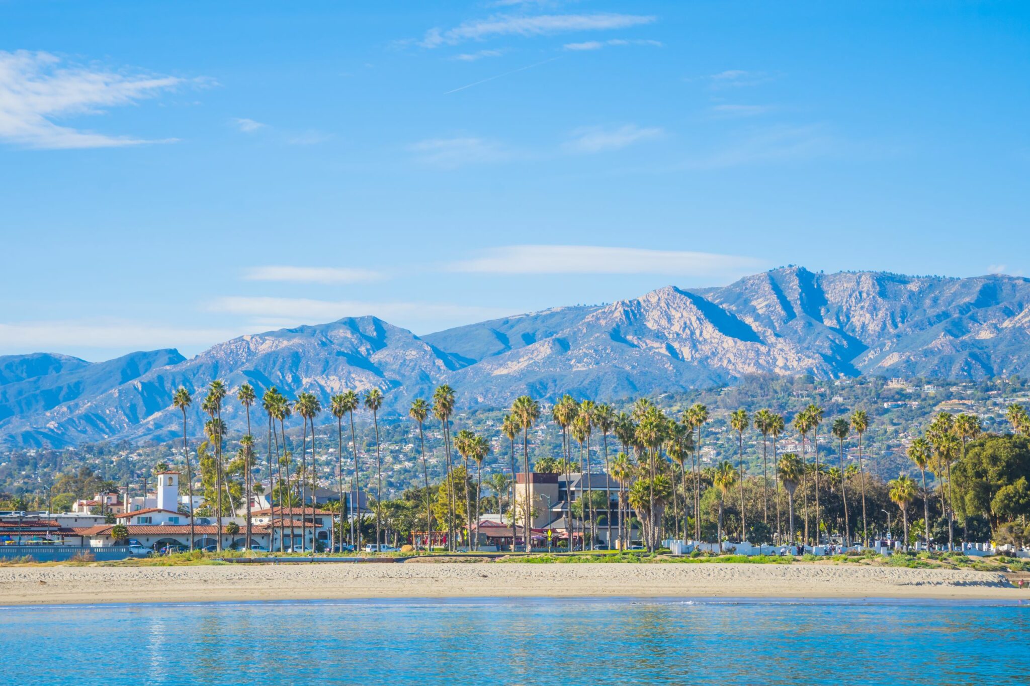 Santa Barbara, California view of the mountains and palm trees near the beach