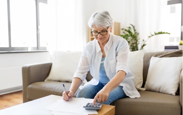 Senior woman checking her finances.