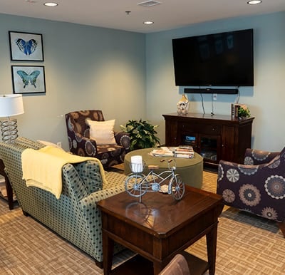 Lounge area with big-screen TV in Williamsville, New York.